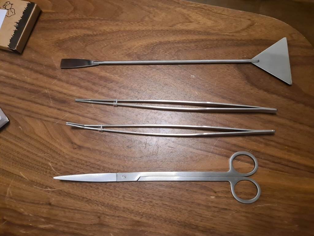 Ohtomber long tweezers to plant stem aquarium plants in gravel substrate
