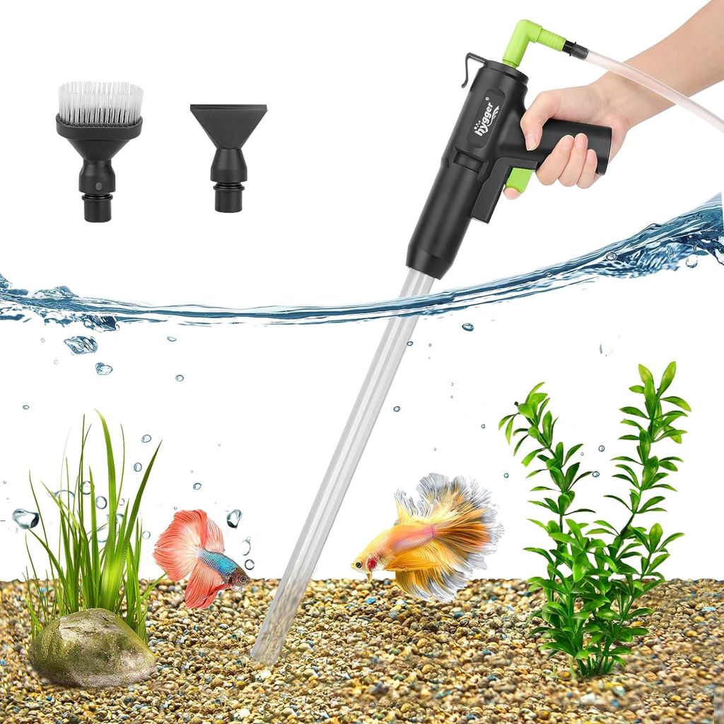 Fish tank maintenance with gravel cleaner extracting waste from aquarium stones and sand